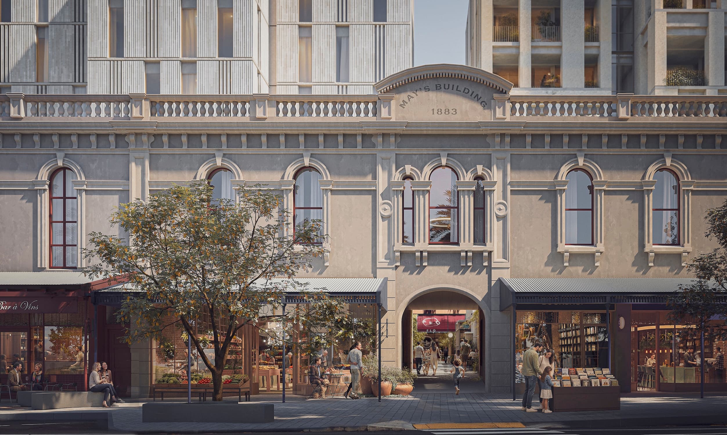 The refurbished Mays Building reopens its heritage arcade as a memorable threshold from Victoria Road into Devonport Lanes, with the central archway drawing people into the village spaces beyond.