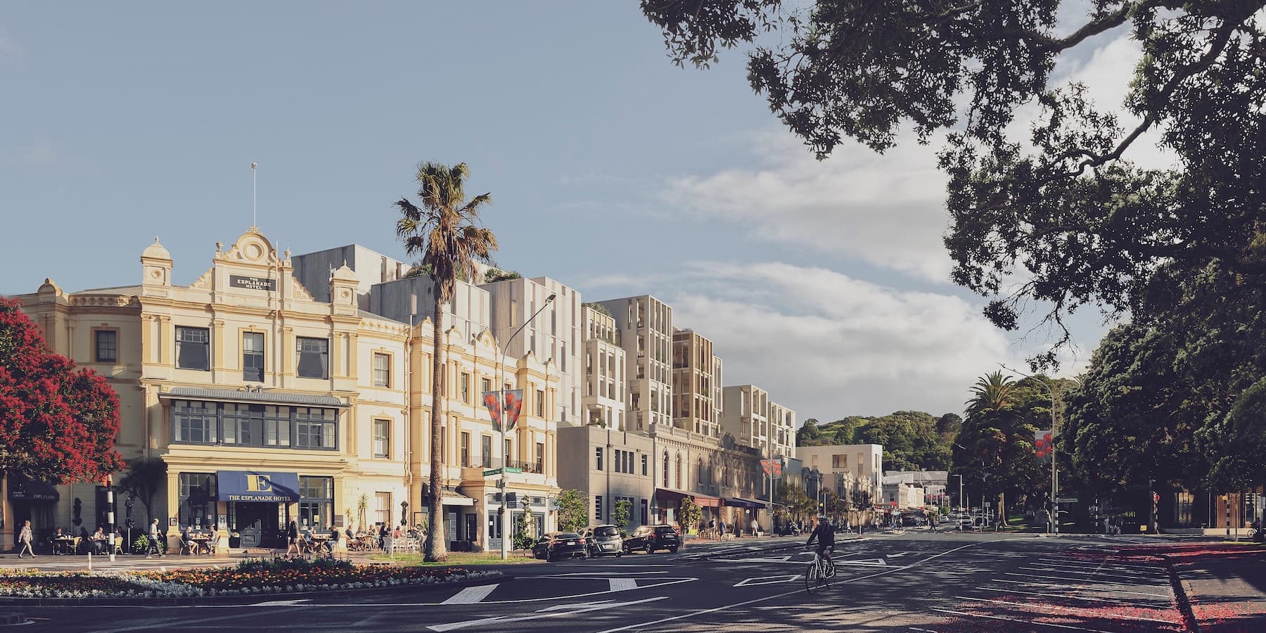 The hotel and apartments step up behind Victoria Road’s restored heritage buildings, adding new life to the town centre while allowing the historic shopfronts to remain the hero.